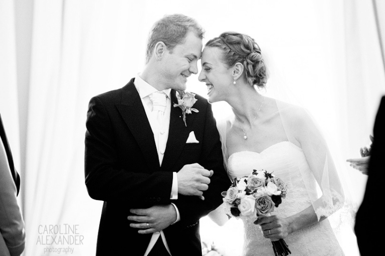 giggling at wedding ceremony