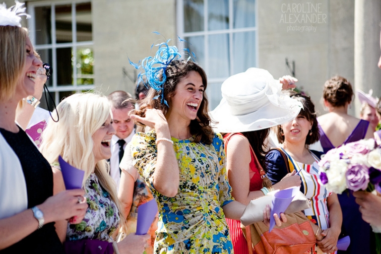 laughing guests at wedding