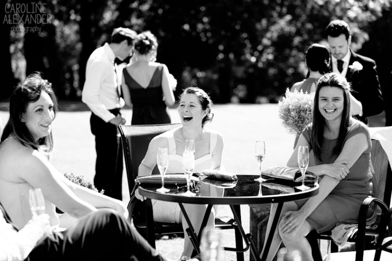 laughing guest candid at wedding