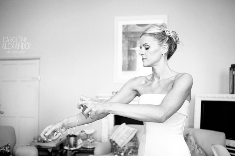 bride putting on perfume