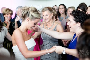 bride and sister in law dancing