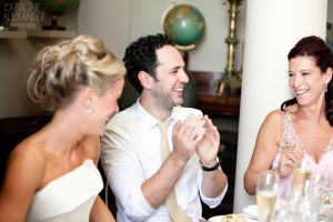 groom laughing at speeches at Aynhoe Park