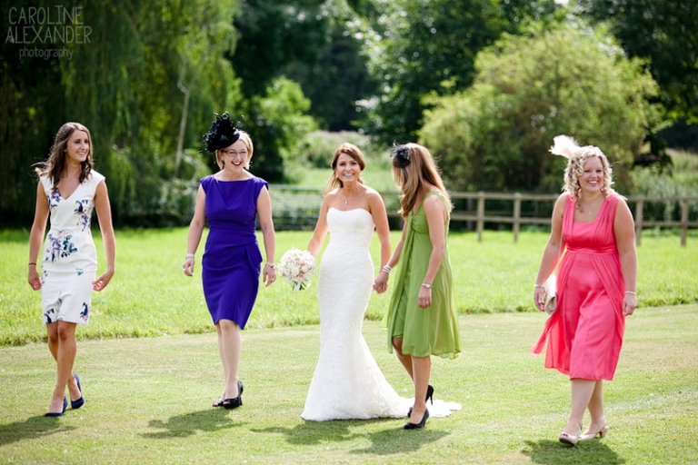 bride and friends walking to ceremony at Barton House