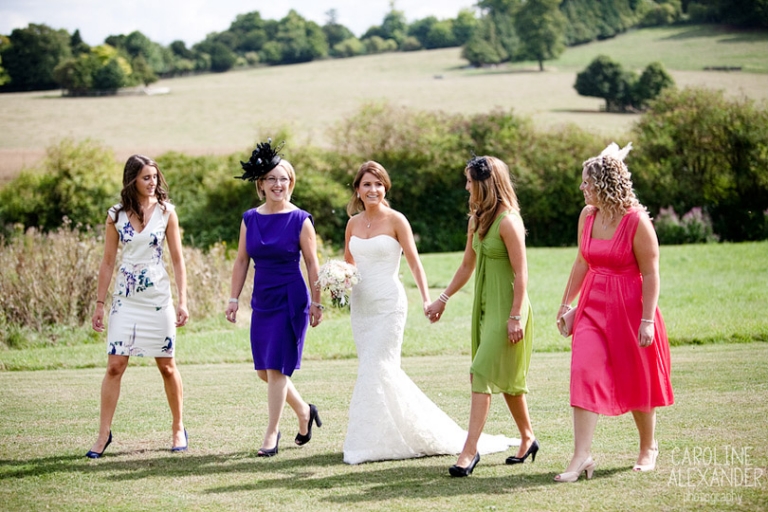 Barton House bride approaches with friends