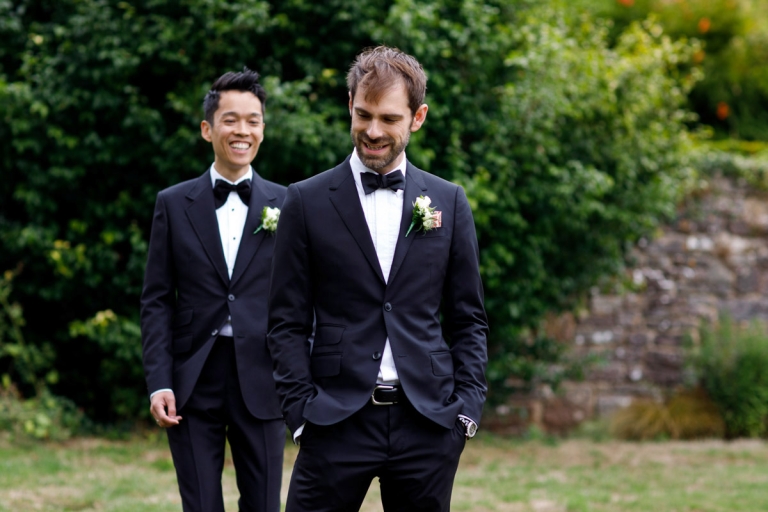 Berkeley Castle Wedding - same sex wedding - groom creeps up to his groom during first look