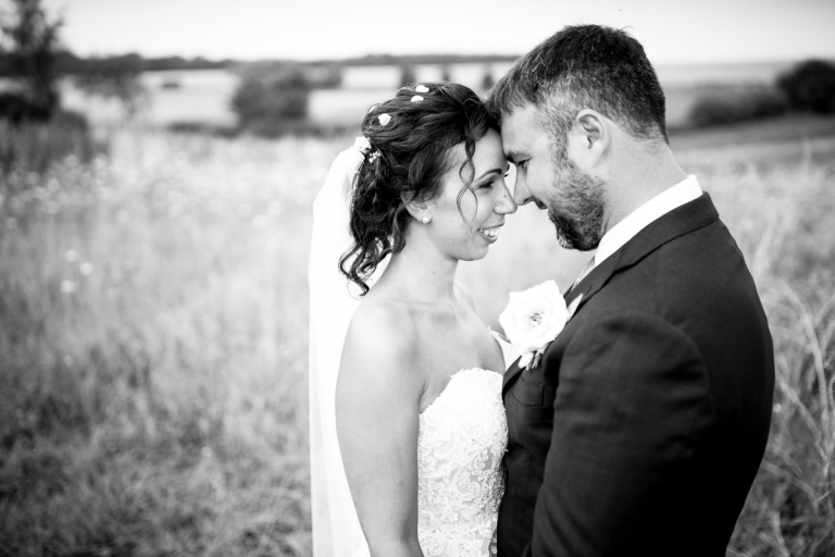 Couple get close at Stone Barn wedding photos