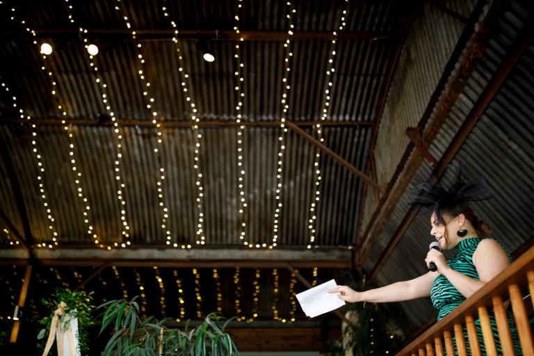 Guest announces bride and groom into the wedding breakfast at cripps stone barn