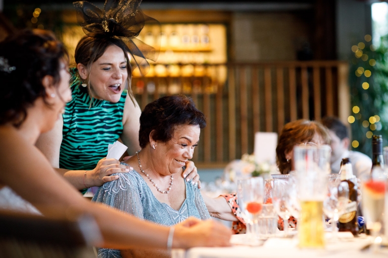 brides mum laughs during speech at cripps stone barn