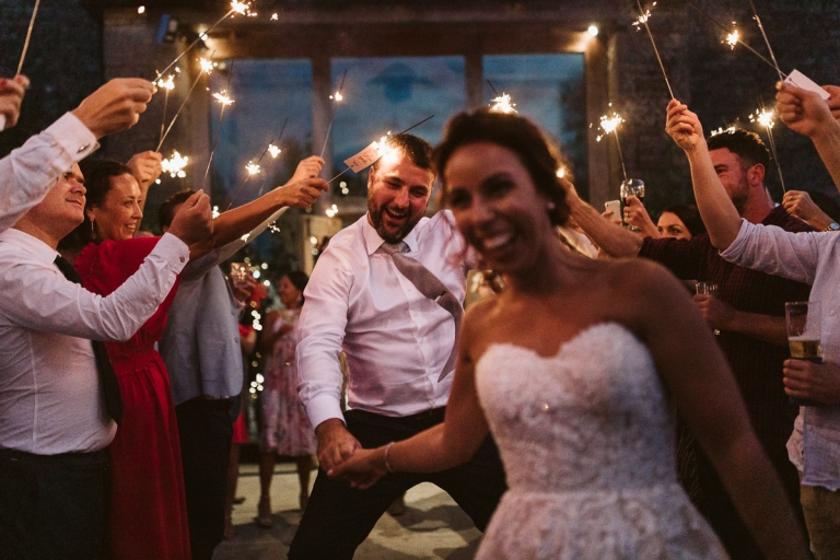 When wedding sparklers go wrong. Groom is hit on head with sparkler during sparkler exit at wedding at cripps stone barn