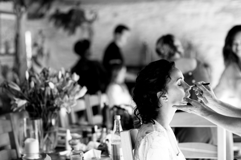 Stone Barn bride having make up done