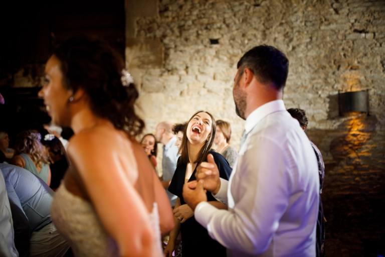 guest dances at wedding at cripps stone barn