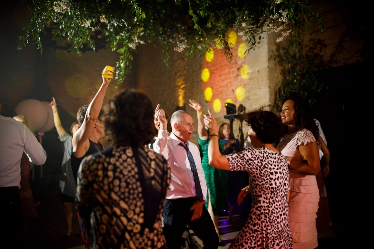 guests dance at wedding at cripps stone barn