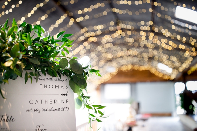 Table plan at Cripps stone Barn, green foliage and fairy lights