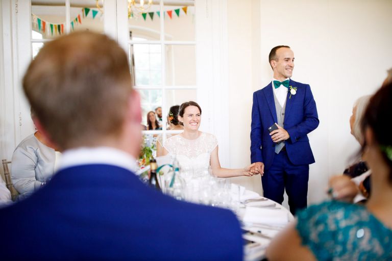 groom gives speech and bride laughs at what he says, bristol wedding venue