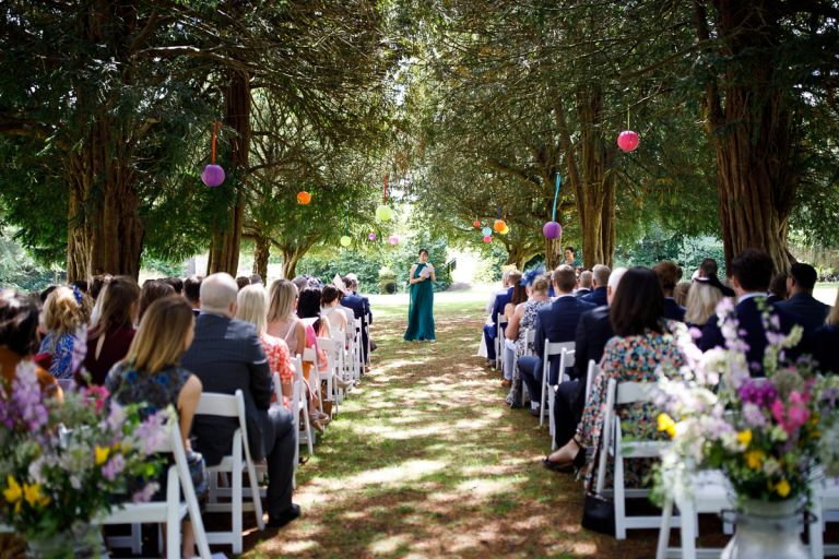 sister of the bride during the outside wedding ceremony at goldney hall in clifton