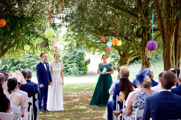 bride and groom pronounced wife and husband outside in the gardens at goldney hall