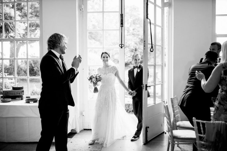 Couple announced into the orangery at goldney hall