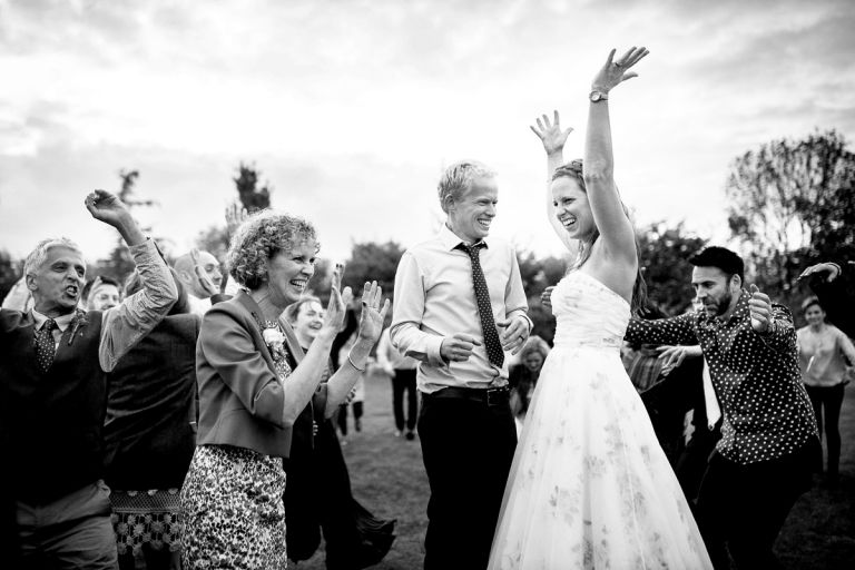 All guests worship couple as part of the ceilidh wedding dance