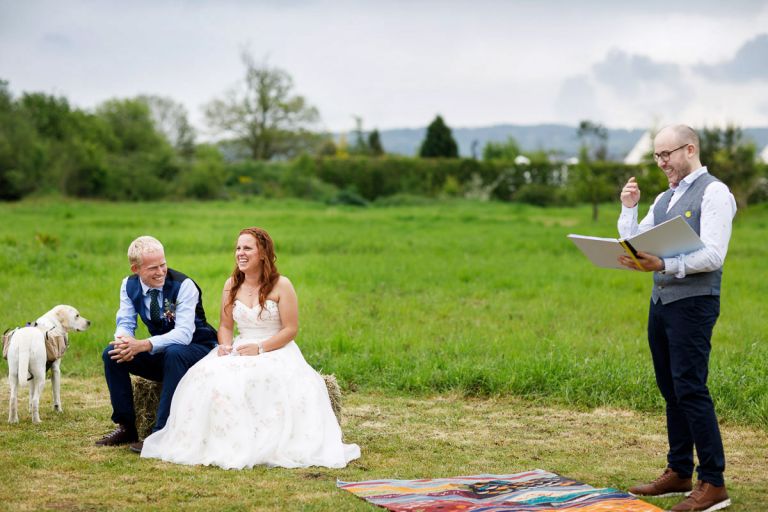 MAD ceremonies makes couple and everyone laugh during their humanist outside ceremony