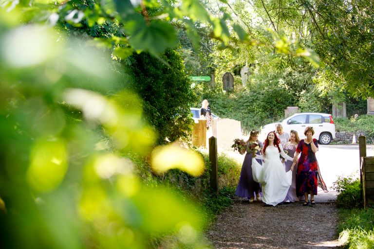Bride arrives with family to Bristol forest wedding
