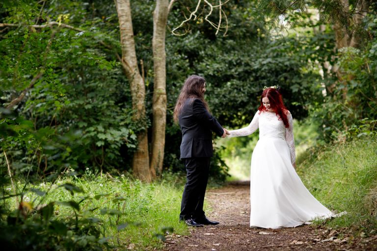 Couple dance at their wedding in the forest