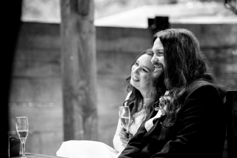 Couple laugh at speeches at arnos vale cemetery