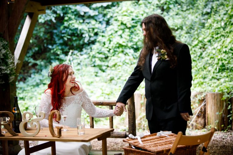 Couple share a moment during speeches at arnos vale wedding photos