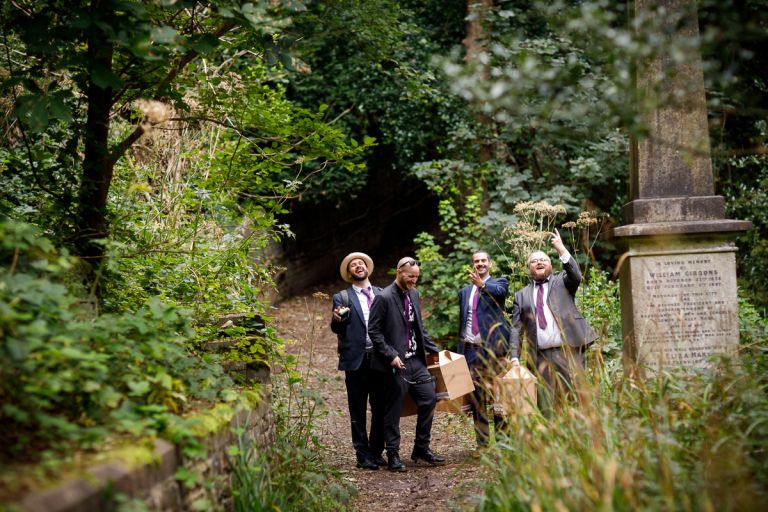 Guest make fun of couple having their photo taken at Bristol forest wedding
