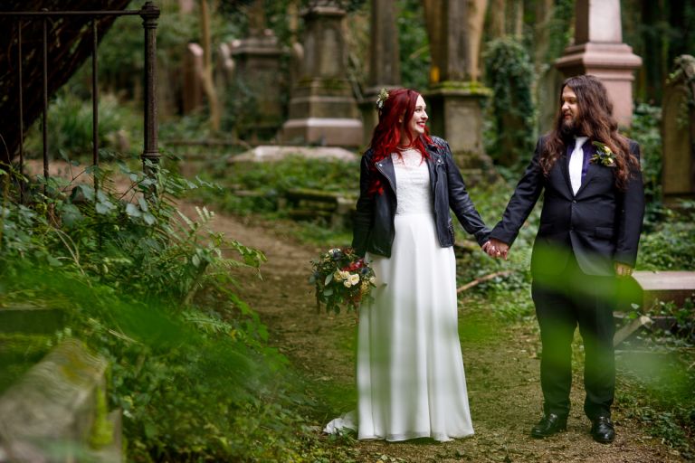 Couple pose in the cemetery at Arnos Vale wedding