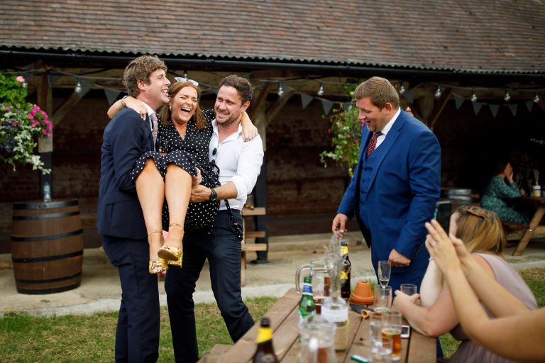 Guests messing around during reception at The Over Barn