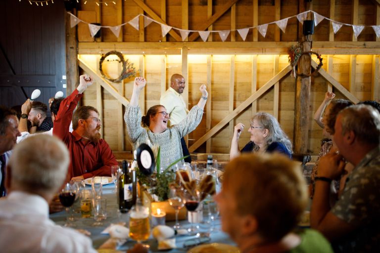 Guests around tables at The Over Barn