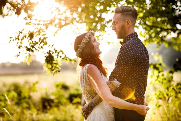 Couple in golden light at The Over Barn