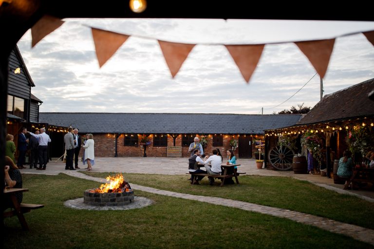Evening courtyard wedding at The Over Barn in Gloucester