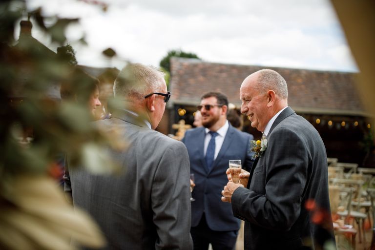 Guests enjoying a drink before the ceremony