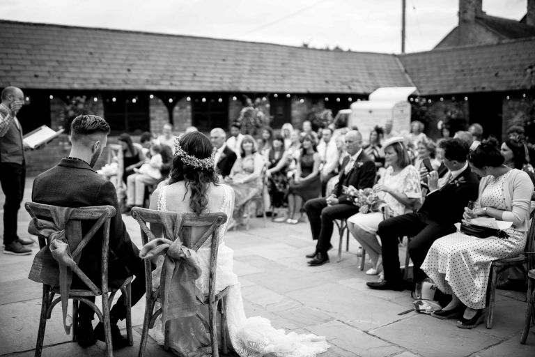 Outdoor wedding ceremony at The Over Barn