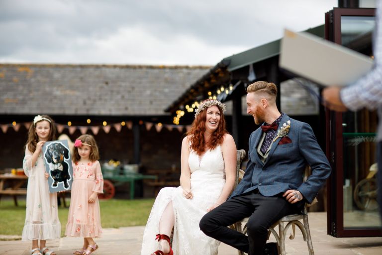 Couple look happy during humanist wedding ceremony