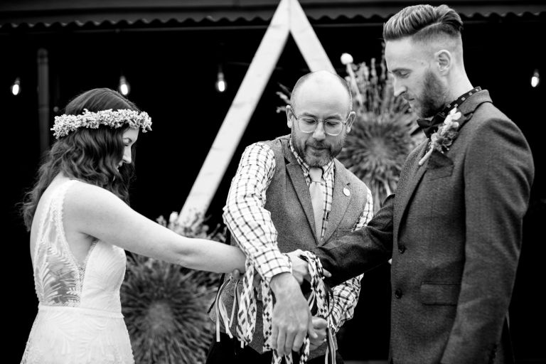 Handfasting during Outdoor Humanist wedding ceremony in Gloucester