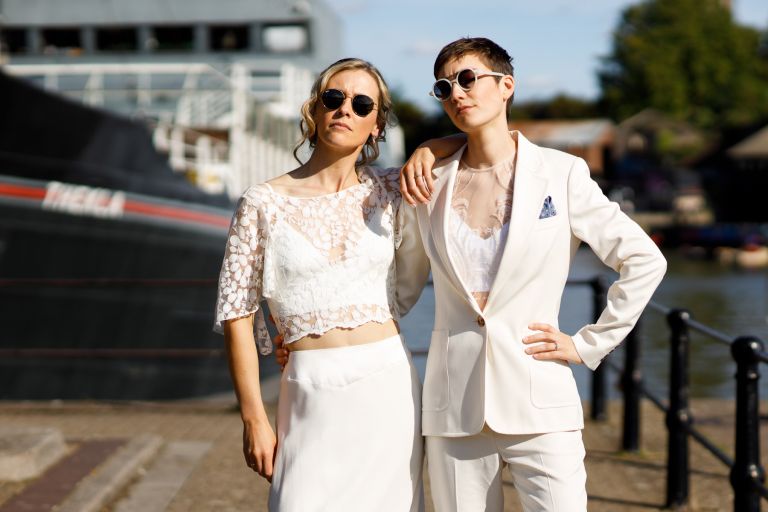 Brides look badass at their wedding at the Mud Dock outside Thekla